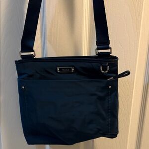 Tumi Navy crossbody teal blue Bag with an adjustable strap